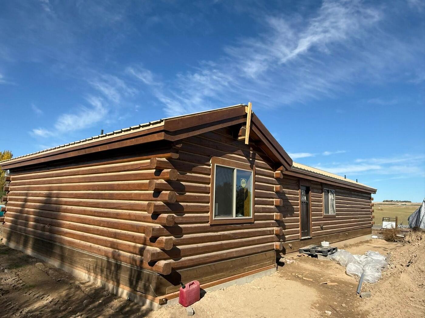 Cabin under construction in the yard