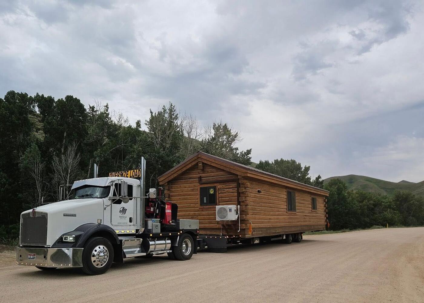 Finished cabin leaving on the delivery truck