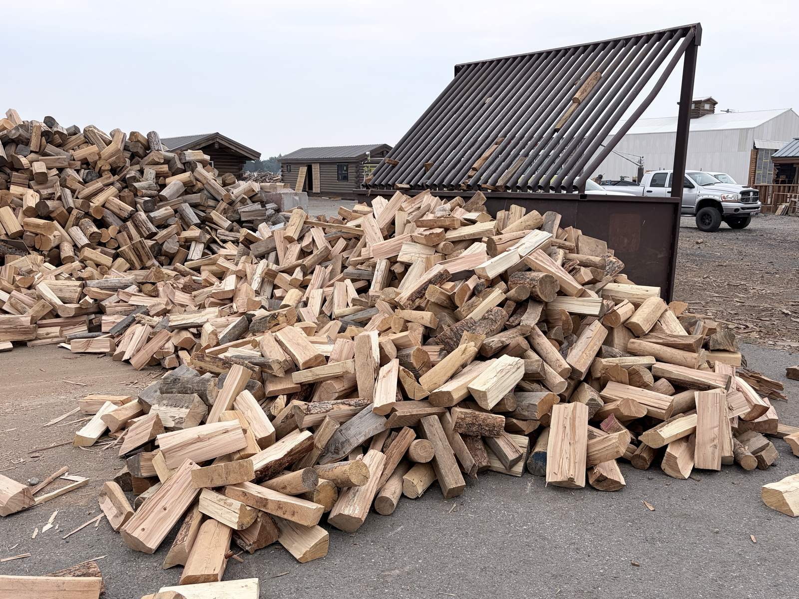 Firewood piled beside the mill shelter